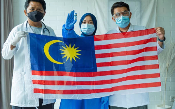 Thumbnail Covid di Malaysia Naik 87,5%, Warga Pakai Masker