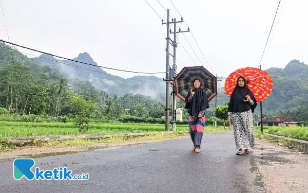 Thumbnail Berita - Siap-siap Payung! Gelombang Rossby Picu Hujan Deras di Pacitan pada Pekan Ini